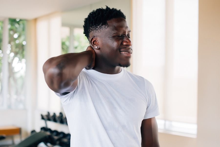 image of man experiencing neck pain