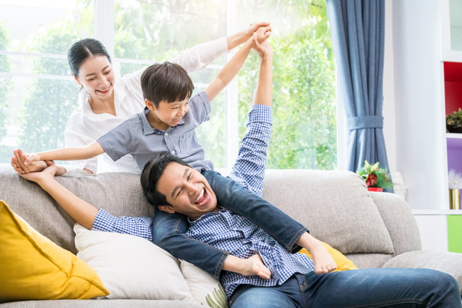 a family playing together and enjoying each other's company